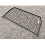 A Land Rover Defender mesh grill. (51in x 24in)