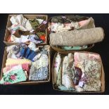 Four boxes of miscellaneous textiles including handkerchiefs, material, bags, beadwork, scarves,