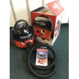 A boxed Numatic Henry Hoover Xtra, with instructions, attachments & spare bag - hardly used.