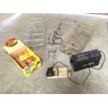 Various animal traps including cage traps, a box of mousetraps, an electronic rat killer, mole