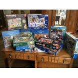 A quantity of boxed 1000 piece jigsaws. (13)