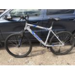 An Apollo mountain bicycle - Phaze, with Shimano equipped gears, padded stitched seat, sprung frame,