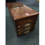 A late Victorian working shop till, the rectangular mahogany box with three drawers having
