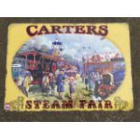 A retro enamelled metal sign, Carters Steam Fair, with oval view of a 50s funfair on yellow ground.