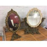 A Victorian painted cast iron dressing table mirror, the oval plate in ivy frame on leaf cast