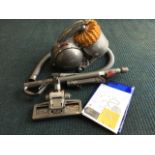 A Dyson Cinetic DC 54 vacuum cleaner, complete with tools, instructions and operation manual, and