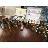 A collection of spirit miniatures - whisky, gin, sherry, liqueurs, etc., mostly sealed; and two