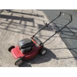 A Mountfield rotary mower with Briggs & Stratton SP530 petrol engine.