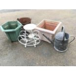 Miscellaneous items including a scrolled wrought iron magazine rack, plant pots, a galvanised 2