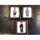 A set of three Chinese textile appliqué gentlemen, the figures with painted faces dressed in