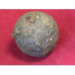 An ancient cannon ball, reputably found at Flodden Field. (2.5in)