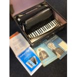 A cased Excelsior multi-musette piano accordion, the instrument with three octave keyboard and