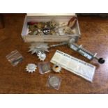 Miscellaneous collectors items including army badges, buttons, a set of military cigarette cards,