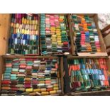 Five boxes of cotton/polyester thread, mixed colours, the spools of various sizes. (A lot)