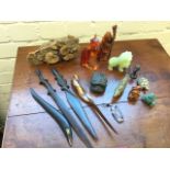 Miscellaneous items including a fossil amonite, carved hardwood paperknives, a hardwood netsuke