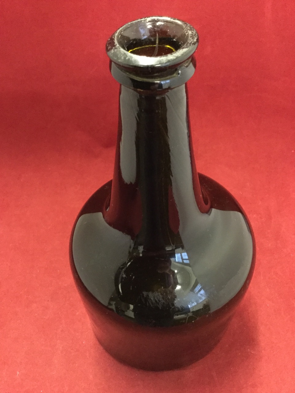 A large mallet shaped late eighteenth century wine bottle with tapering neck and moulded rim, the - Image 5 of 6