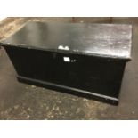 A Victorian pine blanket box, the interior with candlebox, mounted with carrying handles and