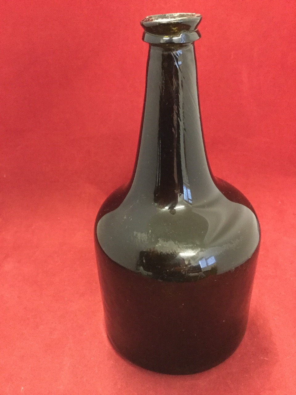 A large mallet shaped late eighteenth century wine bottle with tapering neck and moulded rim, the - Image 2 of 6