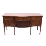 19th century and later mahogany crossbanded serpentine sideboard with three short drawers over