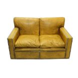 Good quality leather and close stud upholstered twin seater settee of square form,