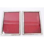 Pair late Victorian silver photograph frame of rectangular cushion form,