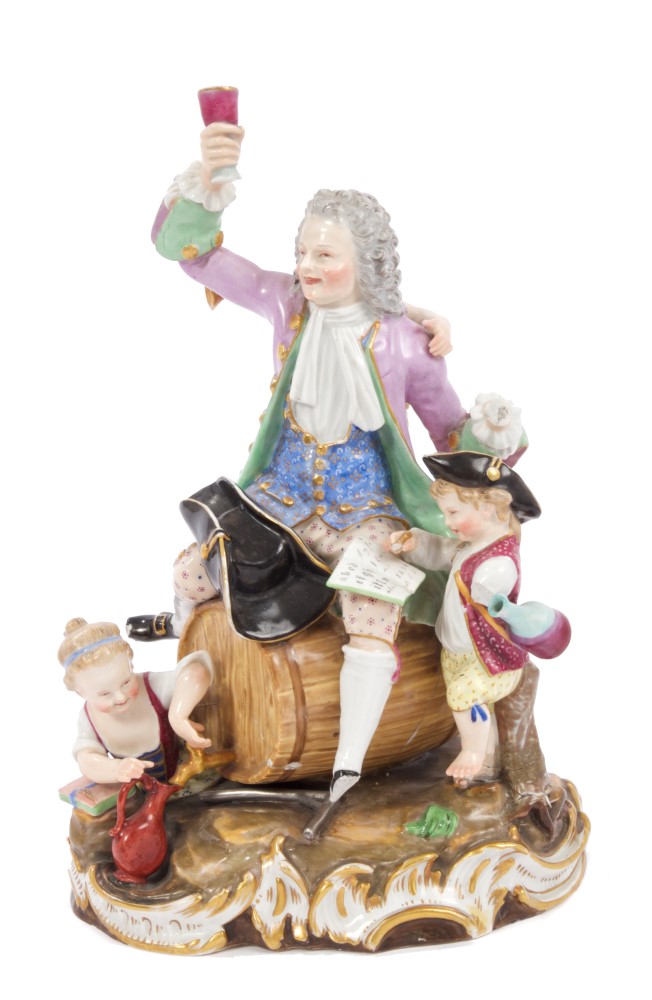 19th century Meissen porcelain group of a gentleman drinker astride a barrel,