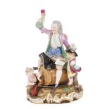 19th century Meissen porcelain group of a gentleman drinker astride a barrel,