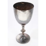 Late Victorian silver trophy cup with engraved fern decoration and traces of inscription,
