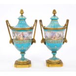 Pair mid-19th century Sèvres porcelain and ormolu mounted vases and covers with painted cherub and