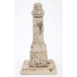 Antique, possibly Roman marble pillar of cylindrical form, on square base with relief-carved emblem,
