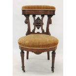 Extremely rare mid-Victorian walnut and ebonised smokers chair - the cushion upholstered top rail