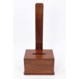 Large 19th century mahogany plate stand or charger stand on rectangular weighted base,