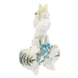 Late 19th century Continental porcelain novelty vase mounted with two parakeets sitting on two