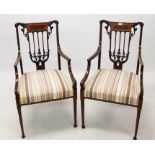 Pair of Edwardian mahogany and satinwood inlaid elbow chairs,