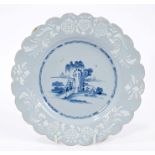 18th century Bristol Delft blue and white plate with central Chinese river landscape within
