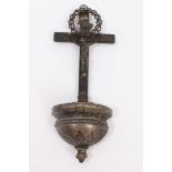 19th century Continental wall mounted white metal holy water stoop of semi-circular form,