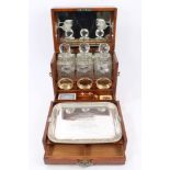 Late Victorian Aesthetic-style golden oak and metal strapwork decanter / games box by Fattorini &