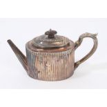 George IV Scottish silver teapot of oval reeded form,