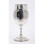Victorian silver goblet with silver gilt interior, embossed floral and beaded decoration,