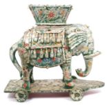 Highly ornate antique Indian carved wood, silvered and polychrome painted model of an elephant,