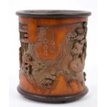 Good quality Chinese carved bamboo brush pot decorated with figures in mountainous landscapes,