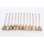 Set of twelve Imperial Russian silver spoons with silver gilt teardrop bowls,