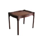 Good George III-style mahogany silver table of serpentine outline,