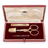 Contemporary silver gilt sewing set - comprising thimble, needle case,