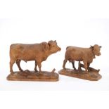 Well-carved pair of late 19th century Black Forest figures of cattle,