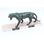 Art Deco-style patinated spelter sculpture of a panther in prowling pose,