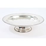 1930s silver fruit bowl of oval form, with faceted decoration and gadrooned border,