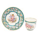 19th century Sèvres porcelain cup and saucer with painted cherub reserves with turquoise and gilt