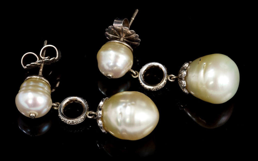 Pair cultured pearl and diamond pendant earrings, each with a 14mm to 15mm x 12.1mm to 12.