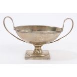 George III silver salt in the form of a shallow two-handled urn with bead border,